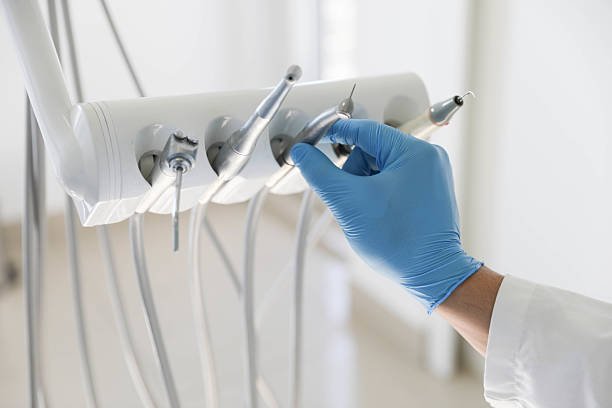 Professional Root Canal Treatment technician working in Woodbury Heights, NJ